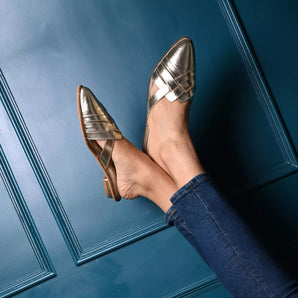 Woman wearing Gold Pointed Flat Mules front shot