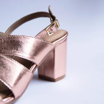 bold rose gold block heels party wear in white background buckleshot