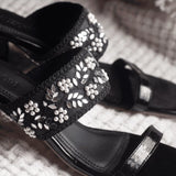 gleaming Black Embroidered Block Heels close up shot 2