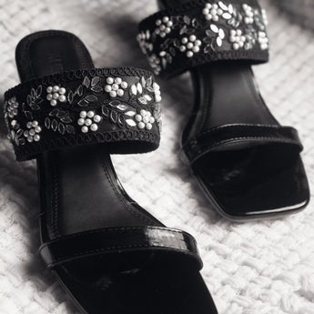 gleaming Black Embroidered Block Heels close up shot