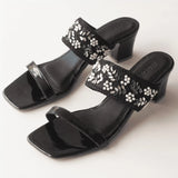 gleaming Black Embroidered Block Heels in white background