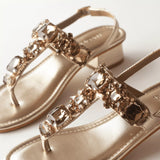radiant gold rhinestone block heels close up stone shot