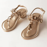 radiant gold rhinestone block heels in white background front shot