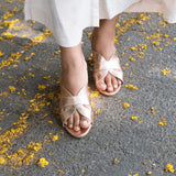 woman wearing bold rose gold block heels party wear