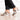 woman wearing bold silver party block heels